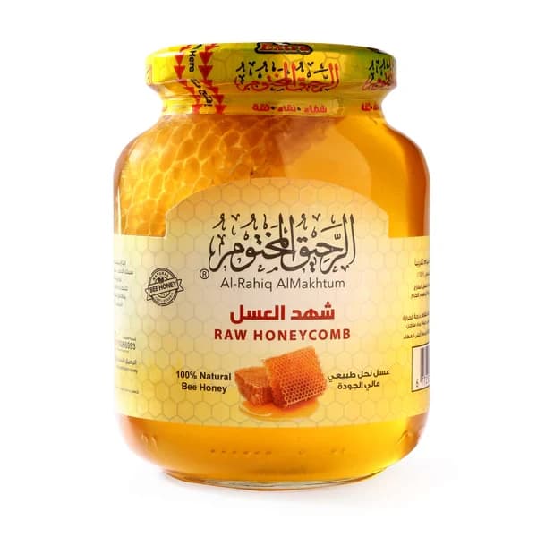 عسل نوارة البرسيم بقطع شهد العسل